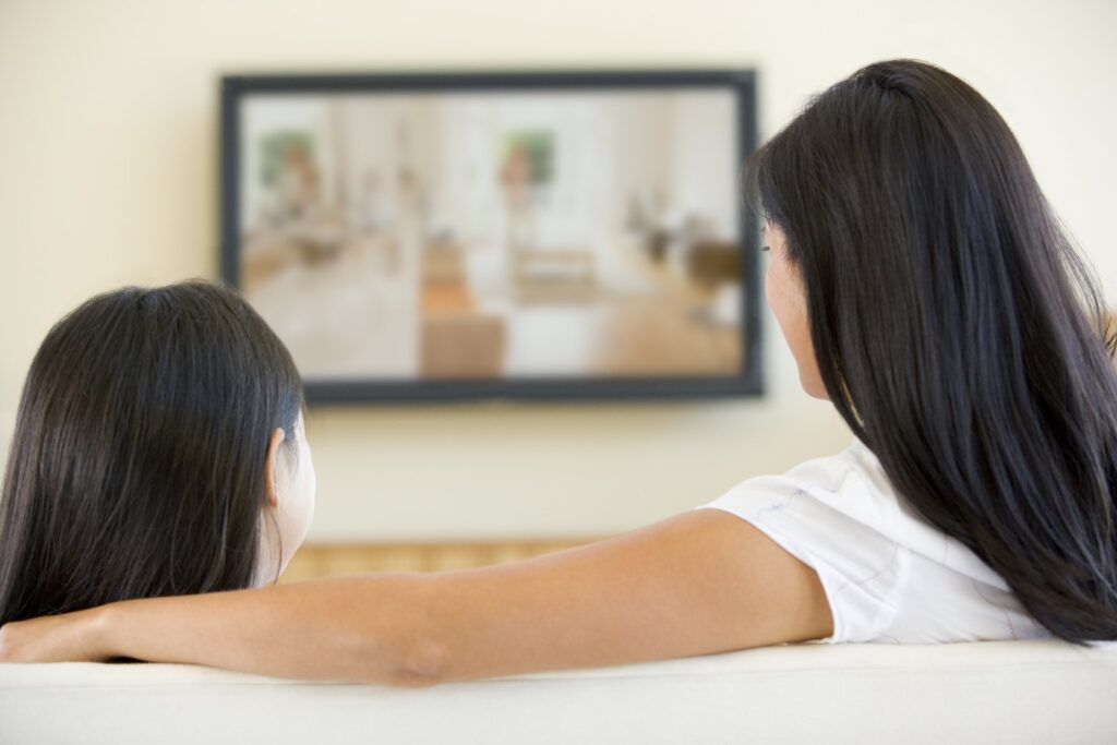 Mother and daughter watching TV