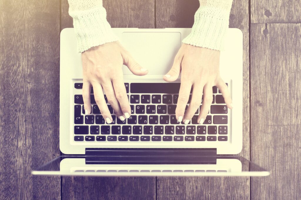 woman using laptop to surf the internet