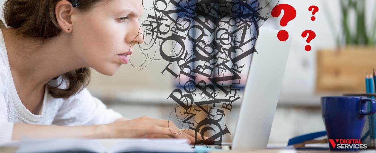 Woman looking confused at a laptop